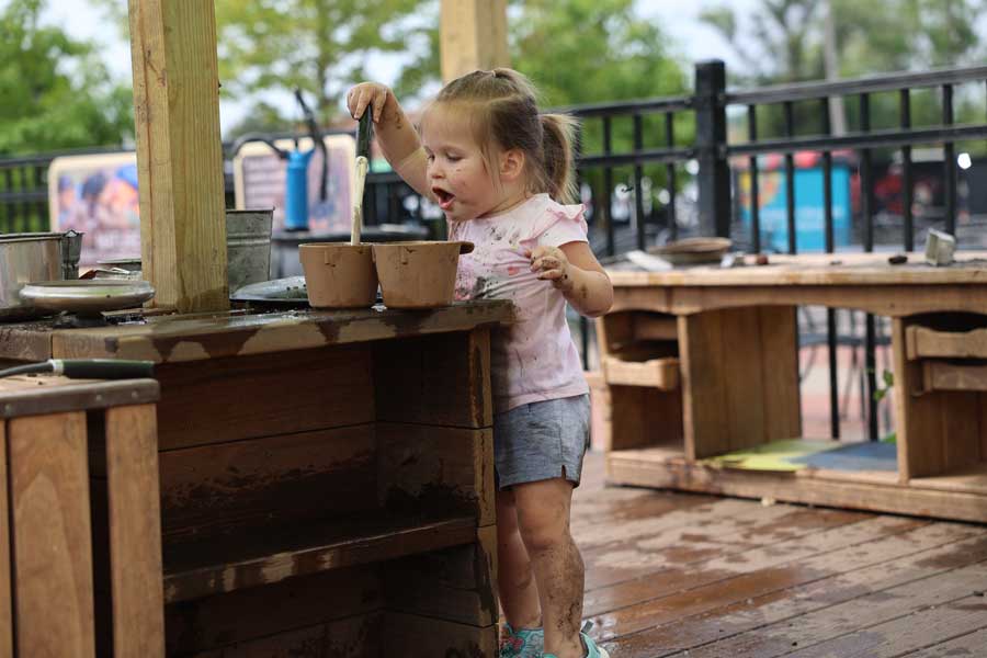 Mud Kitchen nature based play at the Children's Museum in Mankato