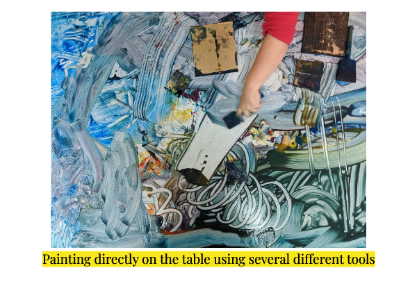 Process-Art-example-activity-painting-on-table-with-different-tools