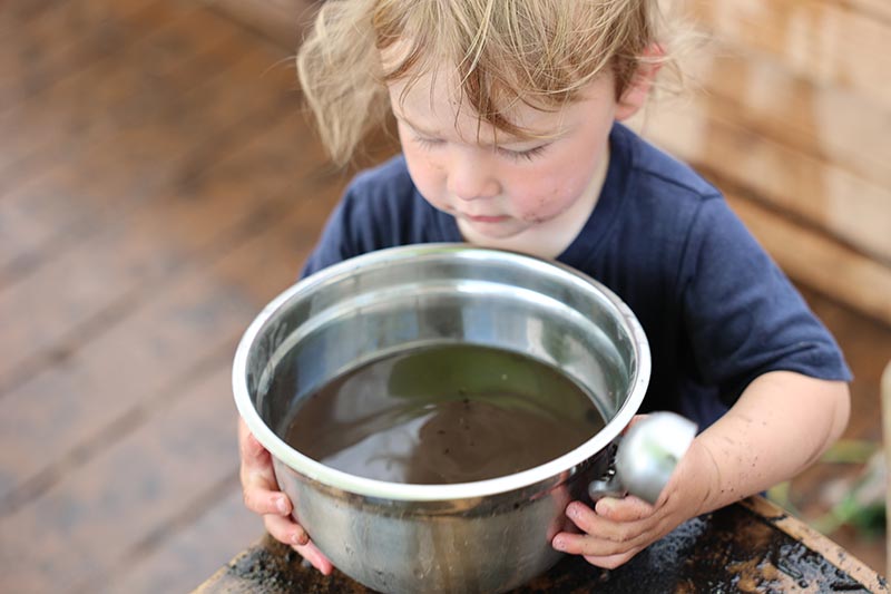 Messy Play in the Mud Kitchen at the Children's Museum of Southern Minnesota in Mankato