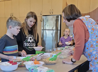 Sewing Group authentic local toys at the Children's Museum of Southern Minnesota