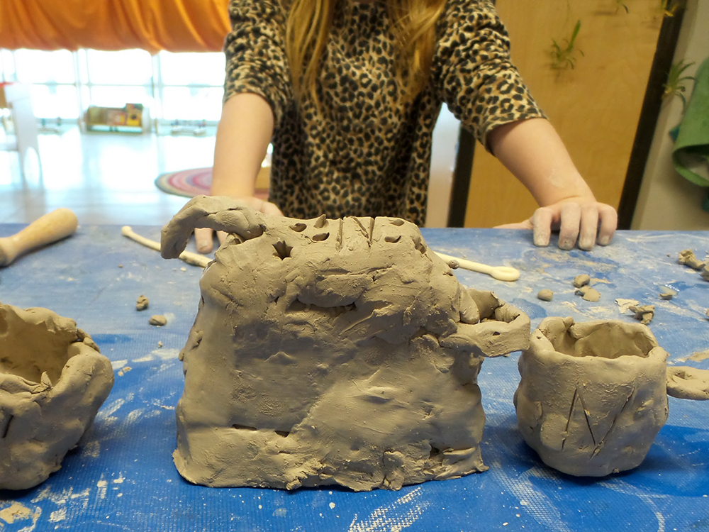Creating with clay at the Childrens Museum Art Explorers