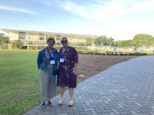 Kim and Heather in front of the LCM campus
